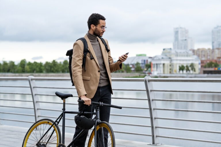 Image of five commuter bikes lined up in an urban setting: a hybrid, a road bike, a gravel bike, a folding bike, and an e-bike—each representing different commuter cycling needs.